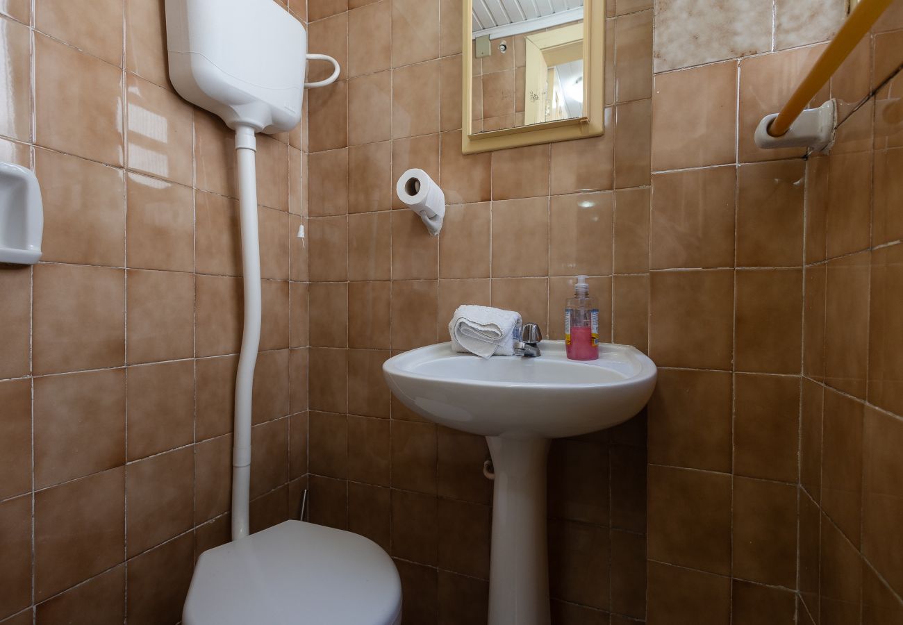 Apartamento em Gramado - Quatro Dormitórios (1 suíte) a 80 m da Rua Coberta