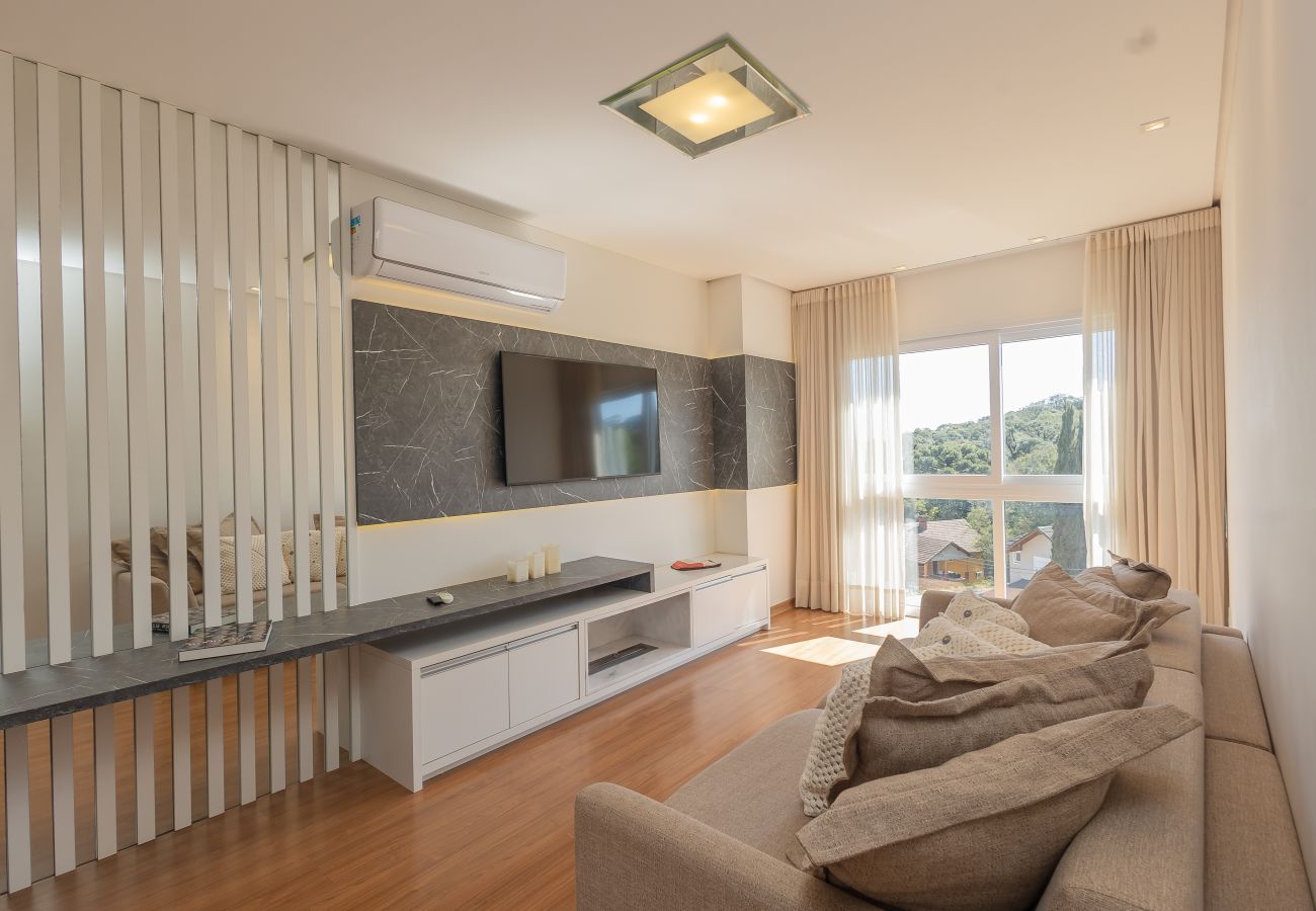 Apartamento em Gramado - Espaçoso Apto Alto Padrão 2 suítes junto ao centro