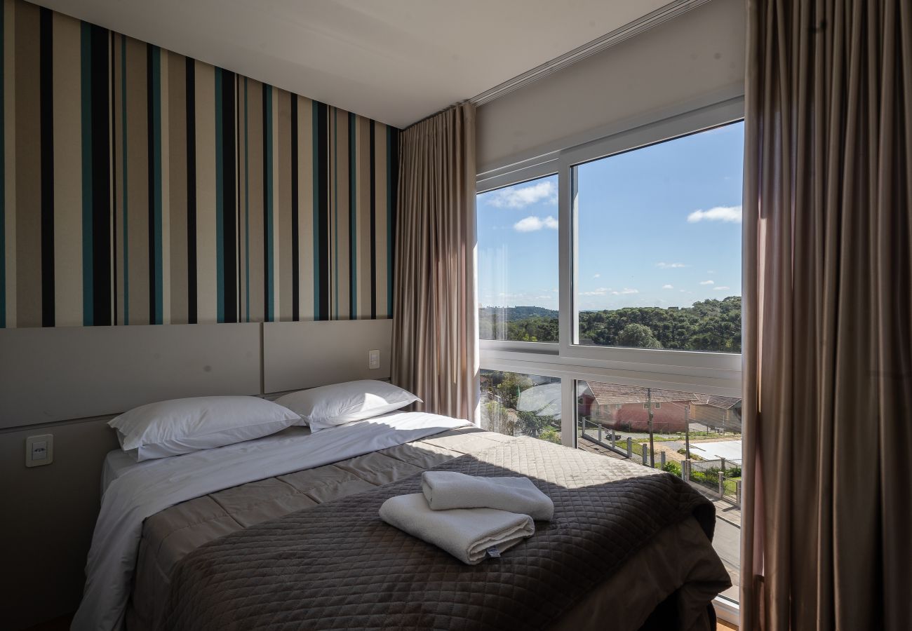 Apartamento em Gramado - Espaçoso Apto Alto Padrão 2 suítes junto ao centro