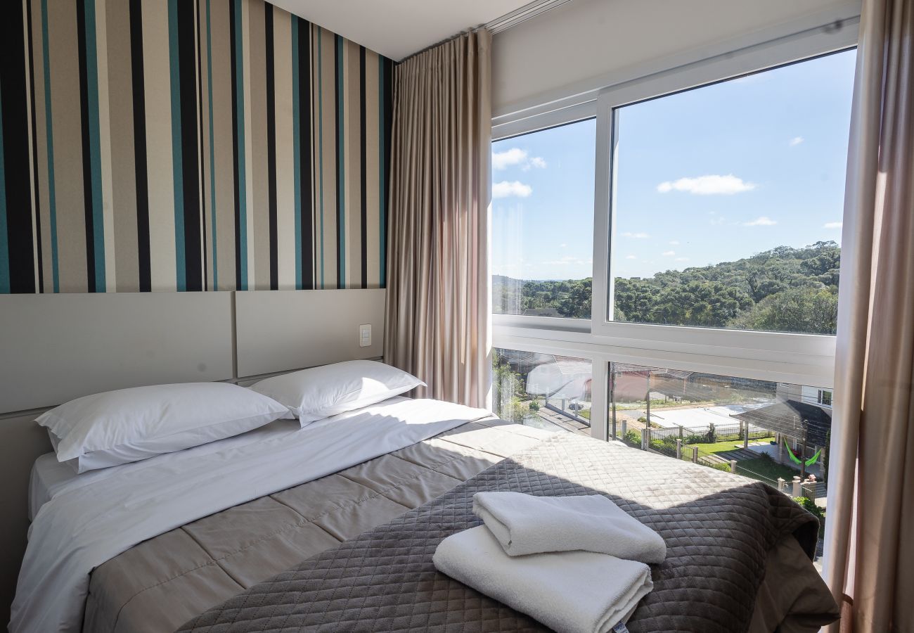 Apartamento em Gramado - Espaçoso Apto Alto Padrão 2 suítes junto ao centro