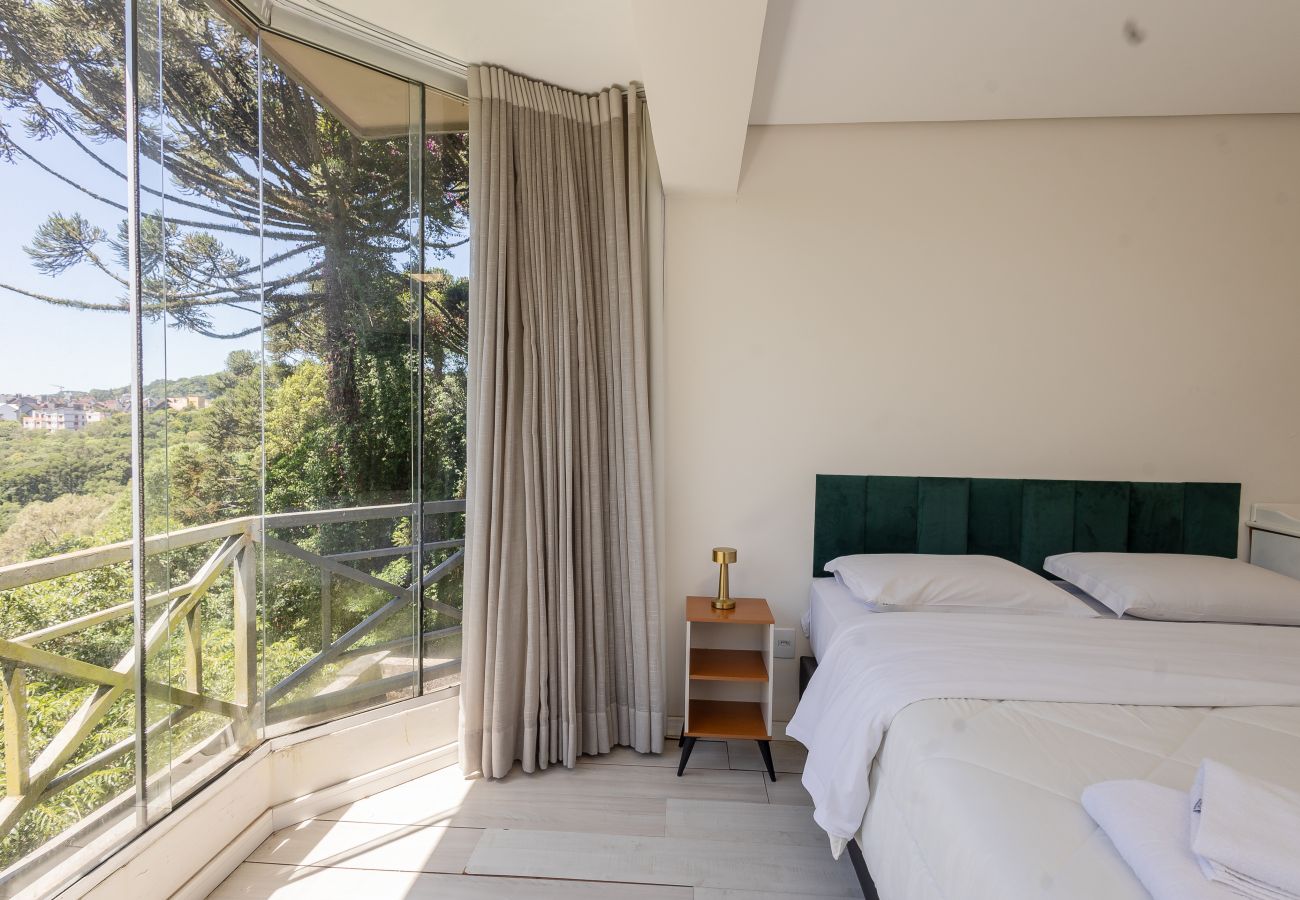 Apartamento em Gramado - Amplo AP térreo 4 suítes a 600m da Rua Coberta